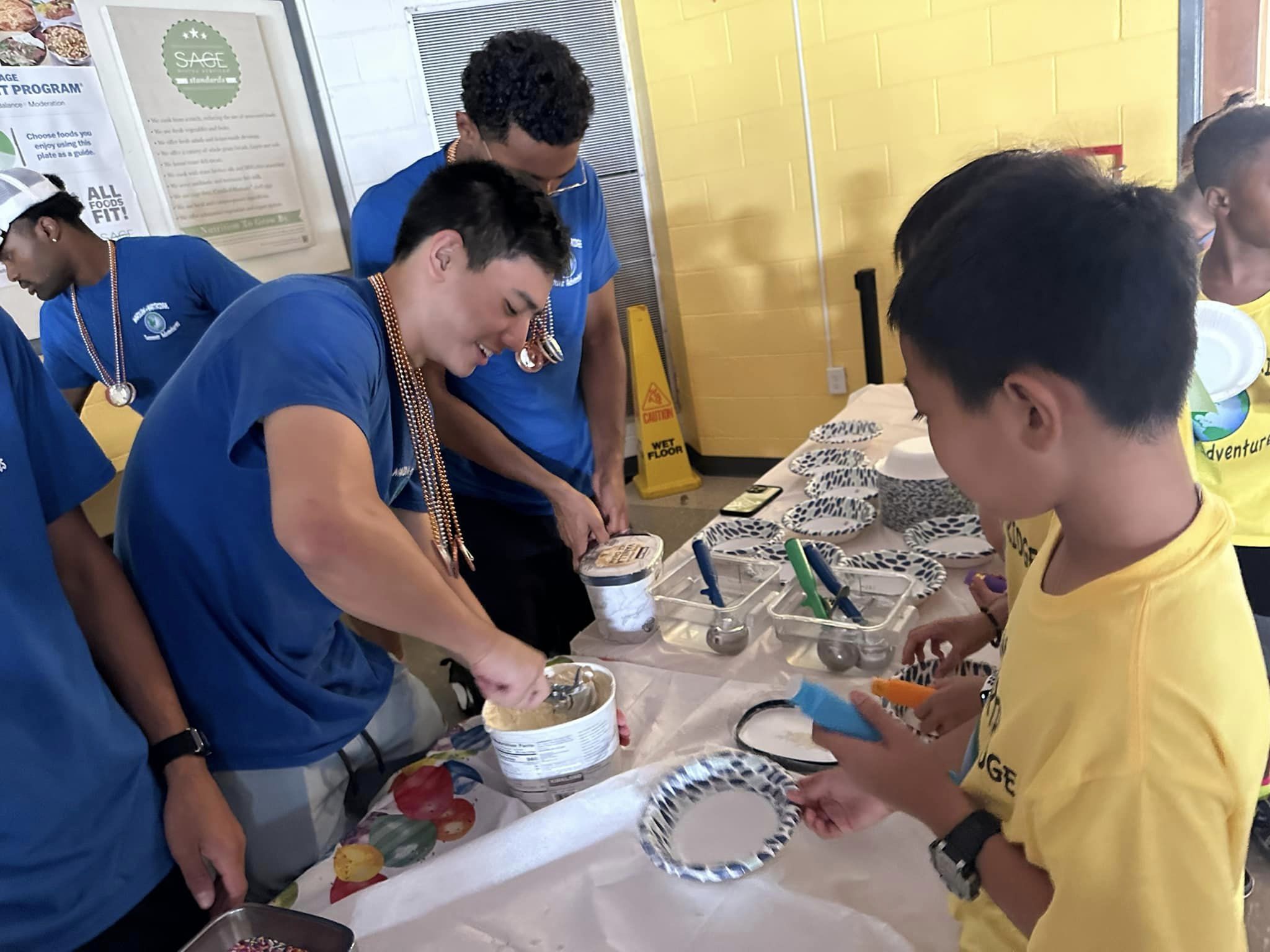 Staff Helping Campers